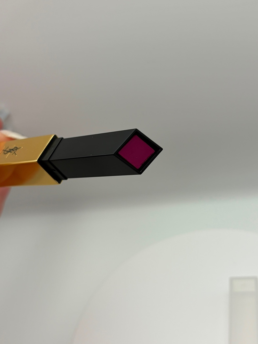Yves Saint Laurent Gold & Black Lipstick with Deep Magenta Shade